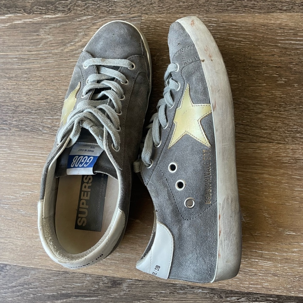 Gray suede super-star Golden Goose Sneakers with gold star and leather heel tab